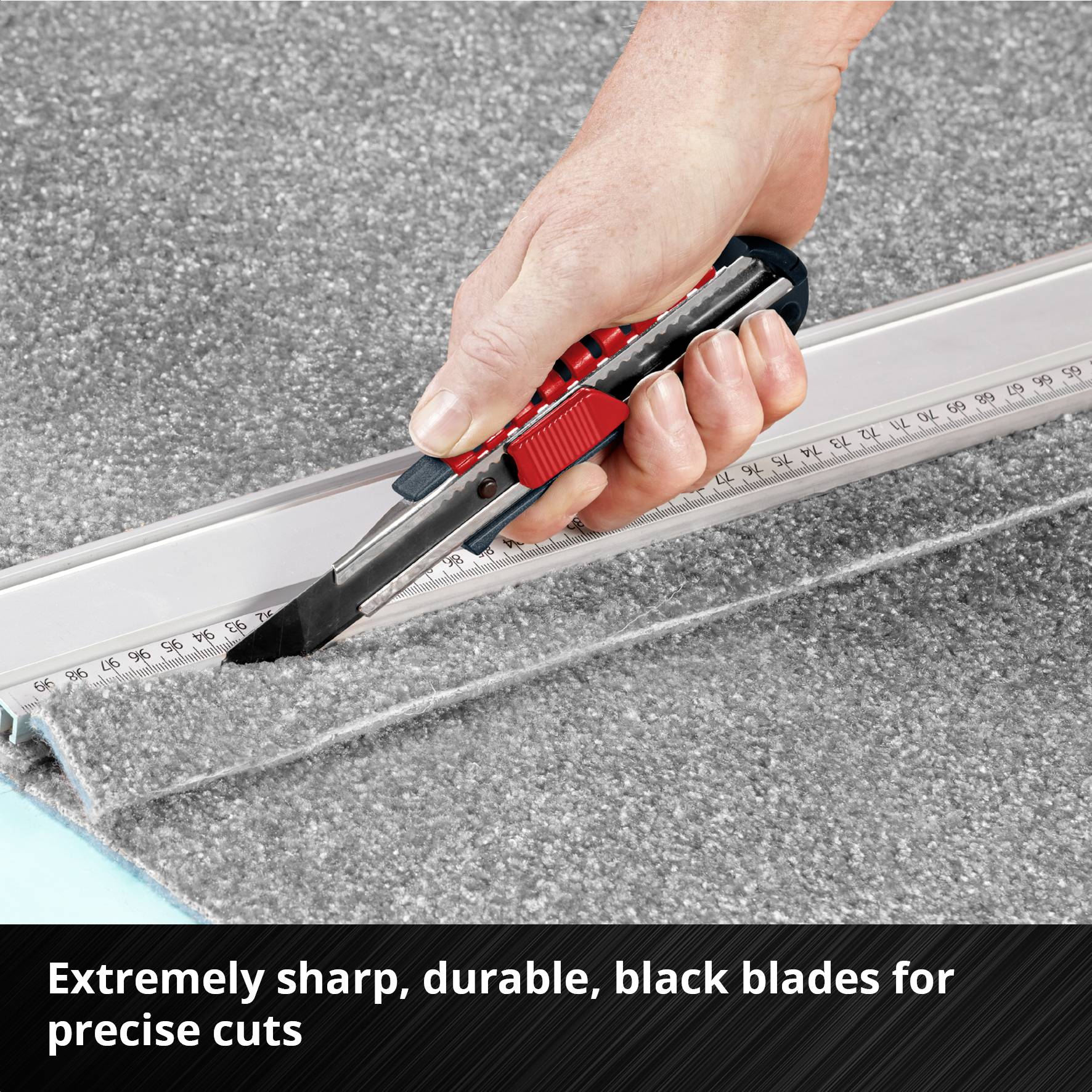A hand holds a carpet knife with a black blade, cutting along a ruler. Text: 'Extremely sharp, long-lasting blades'.