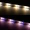 Two illuminating LED strips; one at the top with warm white light and one at the bottom with cool blue light.
