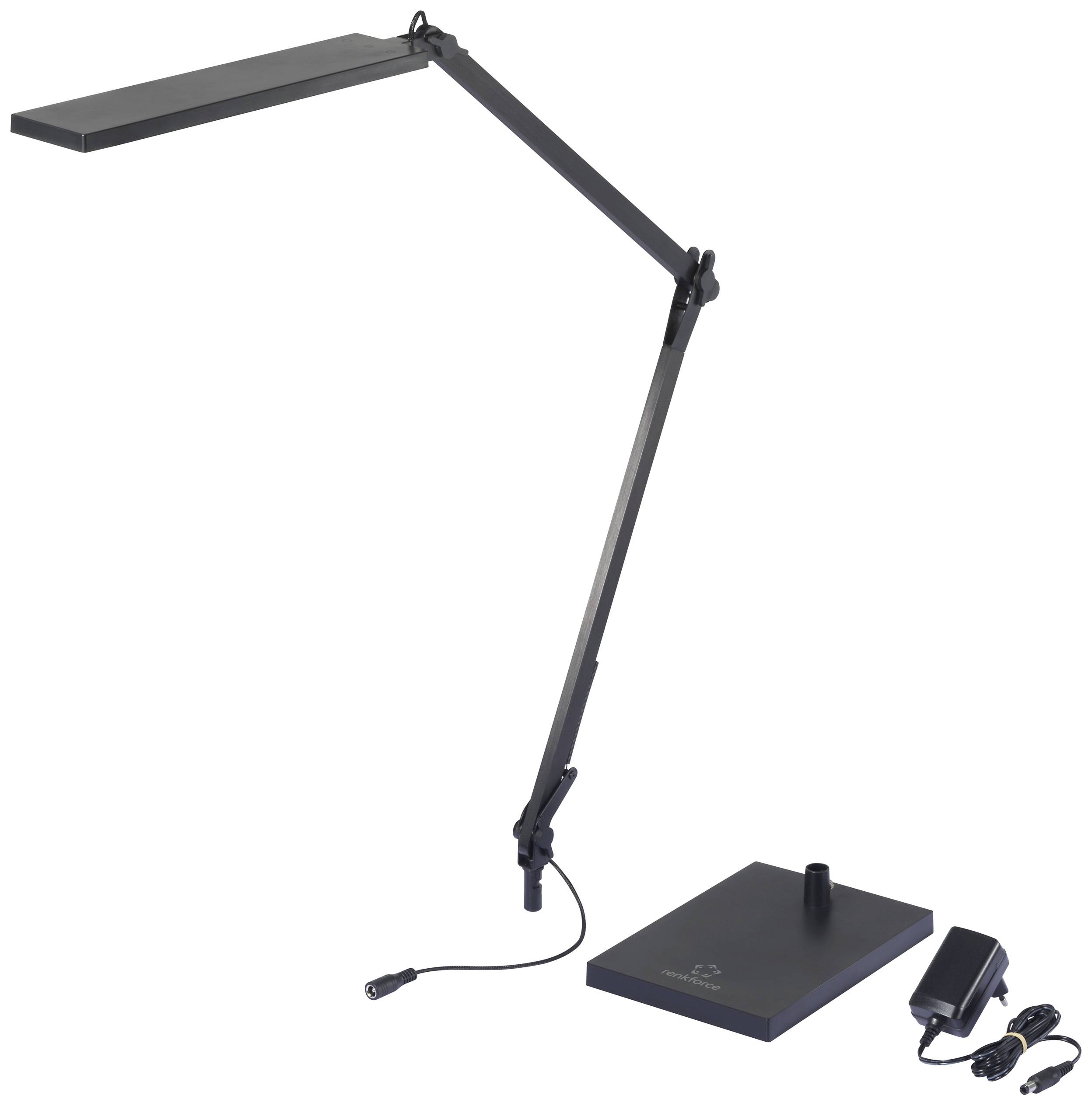 A modern, black desk lamp with an adjustable arm and rectangular lamp head. The matching power adapter lies beside it.