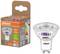 An OSRAM LED light bulb and its packaging. The packaging displays energy efficiency labels, a light output of 850 lumens, and an equivalent power rating of 90W.