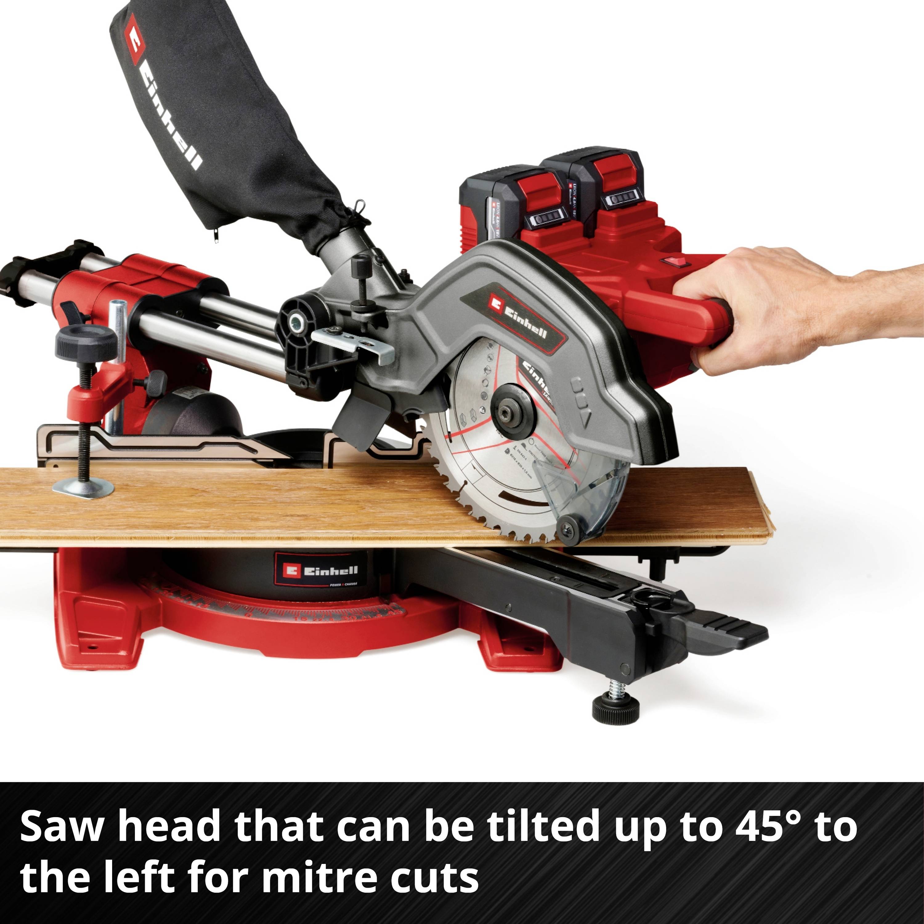 A person is holding a battery charger over a red and black circular saw. Text: 'Twin-Pack Technology – 2 x 18 V Batteries Available Separately'.