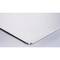 Corner of a silver metal plate with a bevelled edge on a grey background.