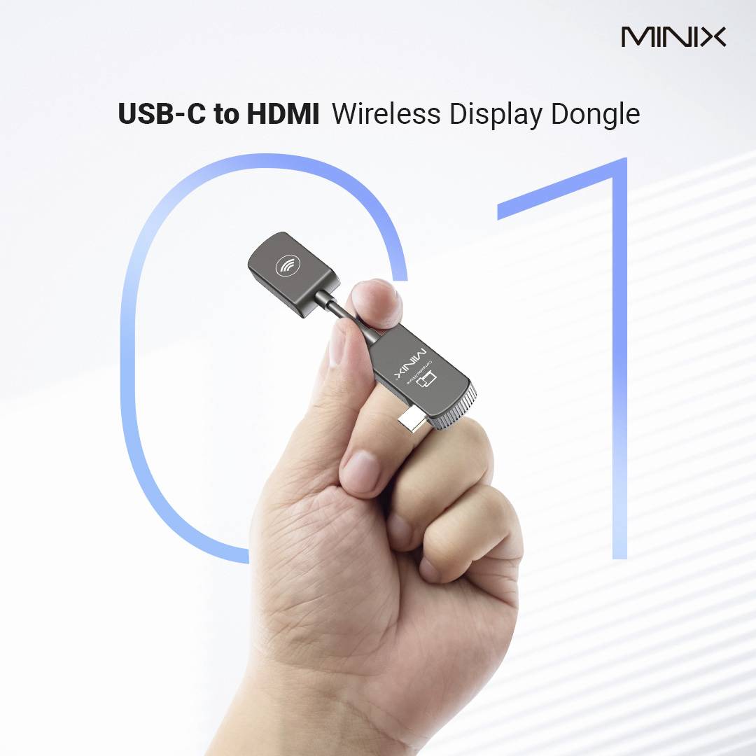 'MINIX USB-C to HDMI Wireless Display Dongle' is held in one hand. It demonstrates the wireless connection capability.