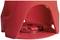 Red plastic lid with a metal fastening mechanism inside. Design for handling or opening a container.