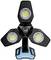 A three-headed LED floodlight with a black housing and blue base, designed for uniform illumination of work areas.