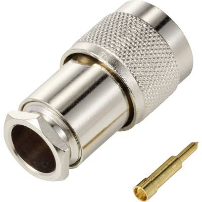 A silver coaxial plug with socket, shown next to a small golden pin. Suitable for electronic connections.