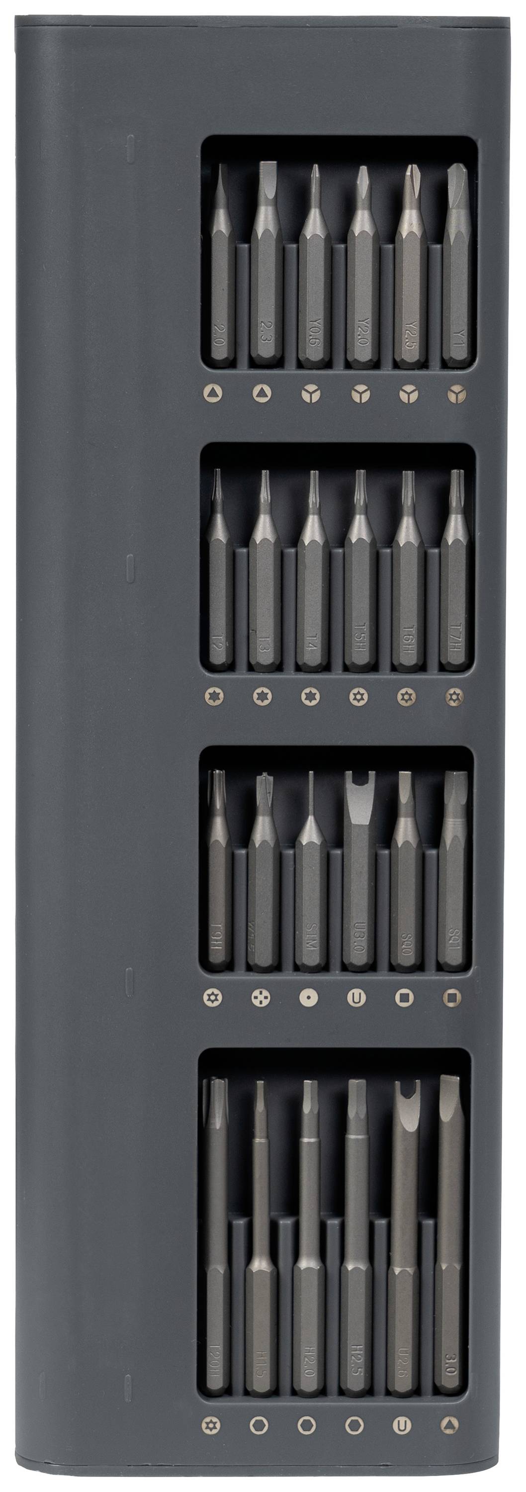 A black toolbox with multiple interchangeable screwdriver bits in various sizes and shapes, arranged in four rows.
