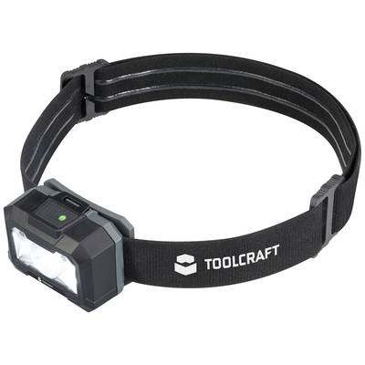 'Toolcraft' head torch with adjustable black strap, large front light and green indicator light, ideal for hands-free work.