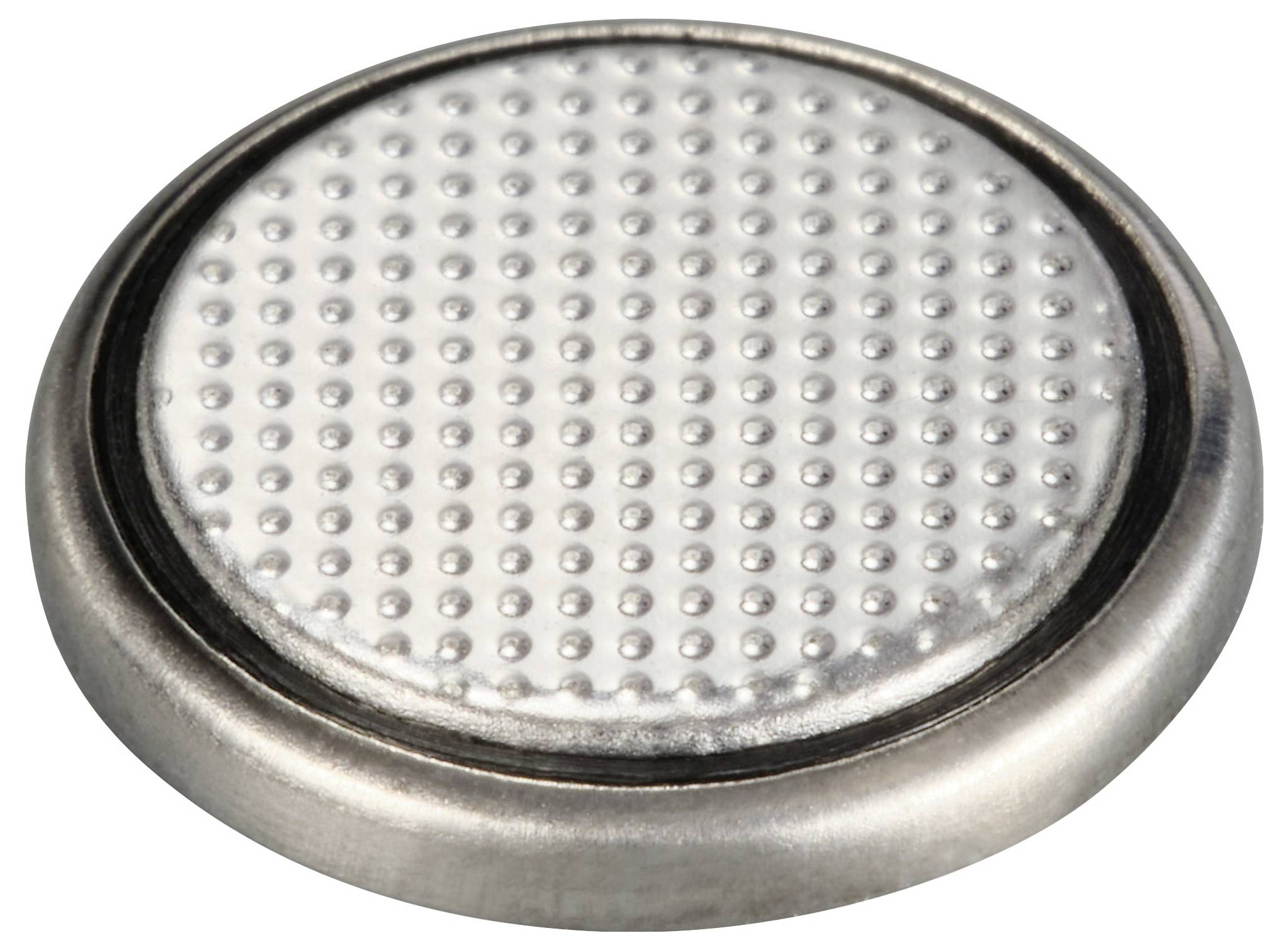 Silver button cell battery with a round, flat shape and textured surface.
