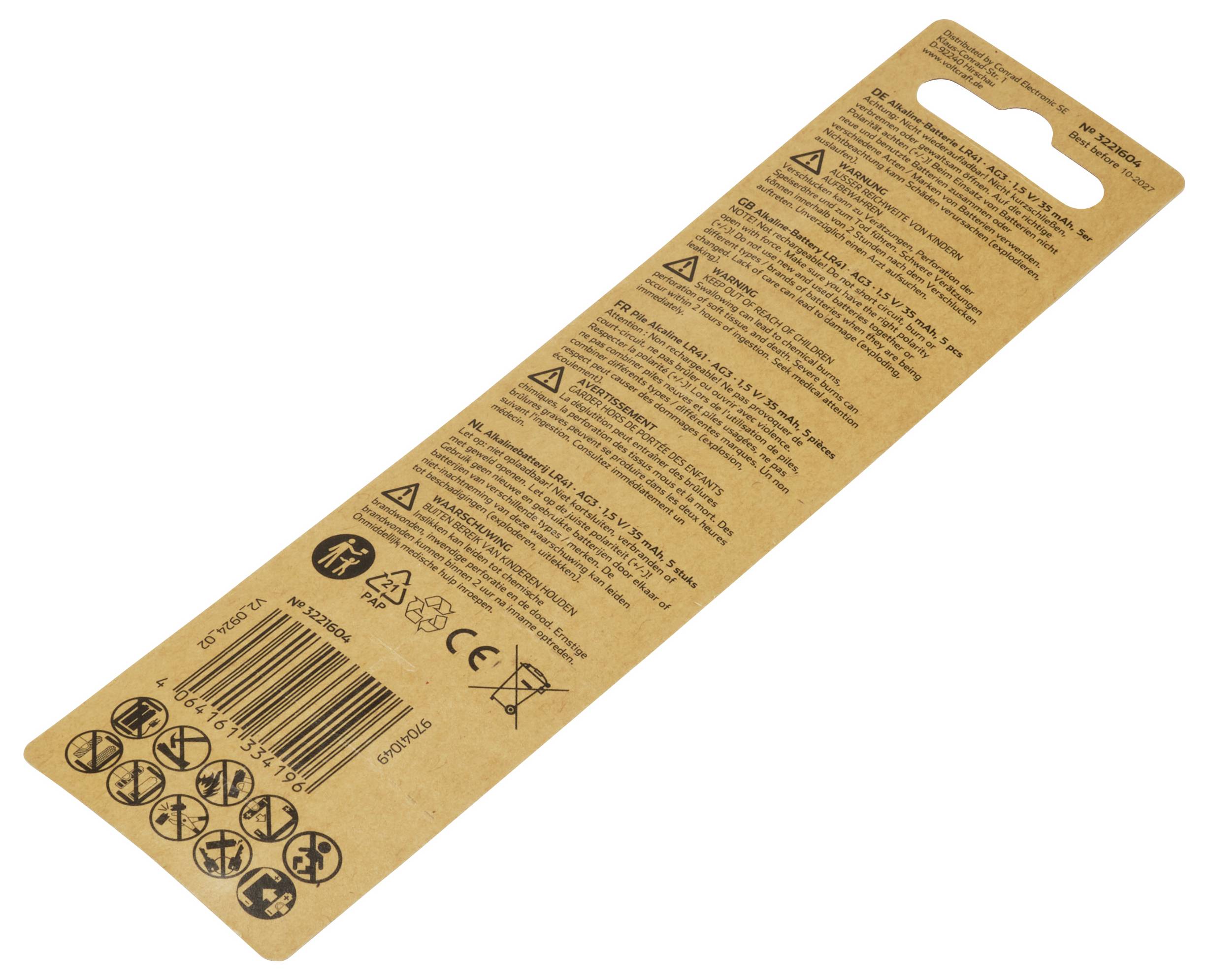 Packaging reverse side of a screwdriver set. Contains safety symbols and warning notices in multiple languages on brown cardboard.