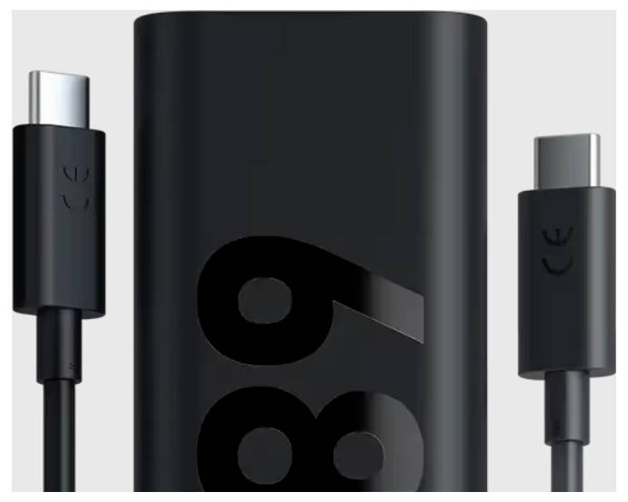 Black charger with two USB-C cables, supporting a power output of 89 W.