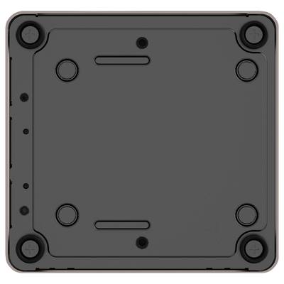 Rear view of a square black box with rounded corners and four screws at the corners.