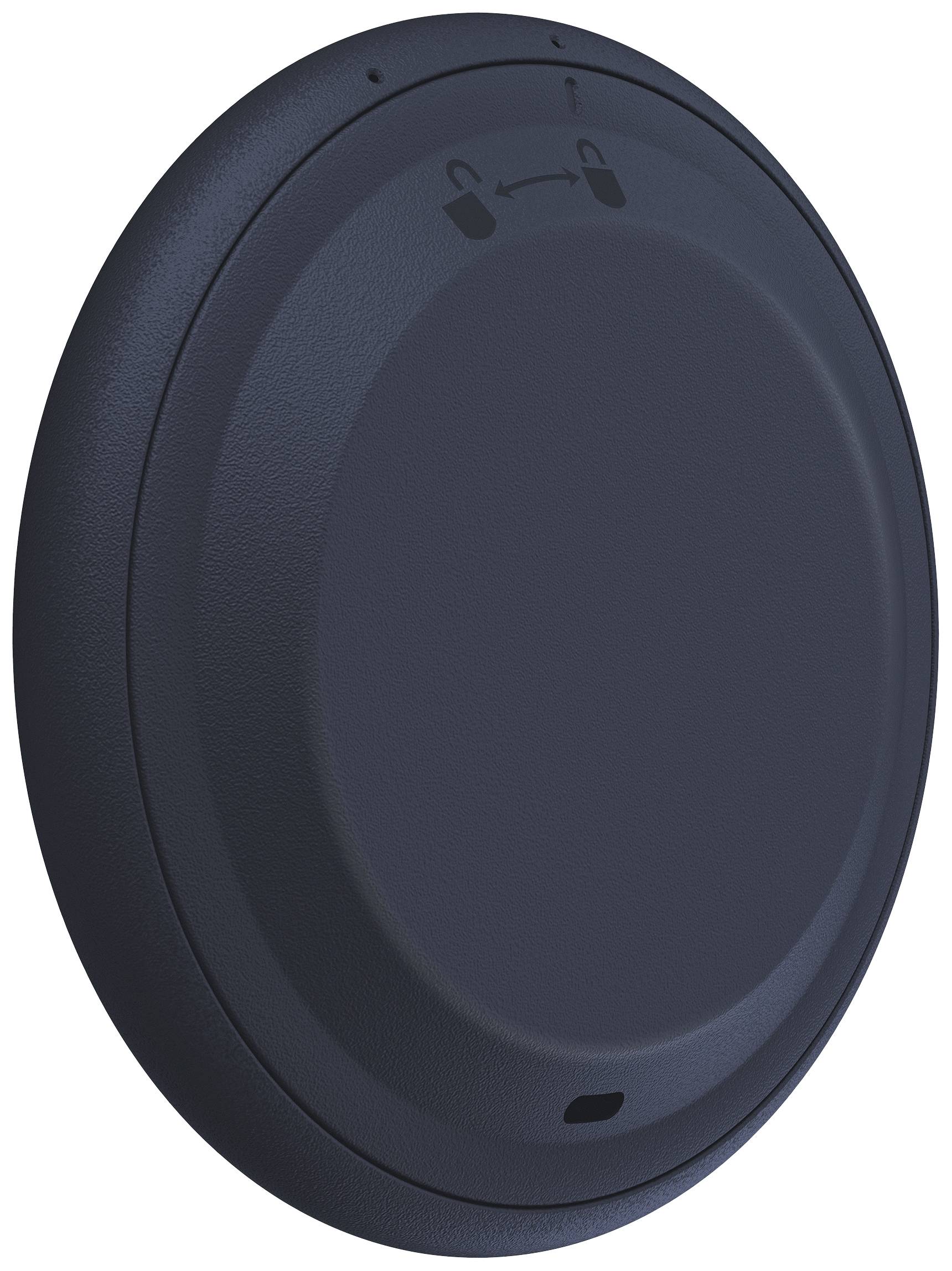 Round, black device with an arrow symbol on top. Intended purpose not immediately apparent.