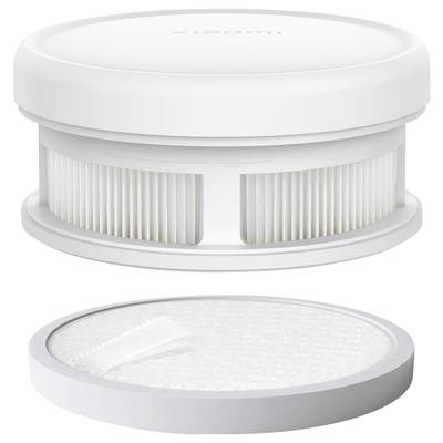 A round, white filter with a ventilated, cylindrical design and a removable lid, likely for air purification.
