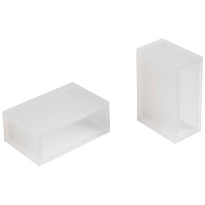 Two rectangular, transparent plastic blocks; one lying flat, the other standing upright. Both are hollow in the centre.