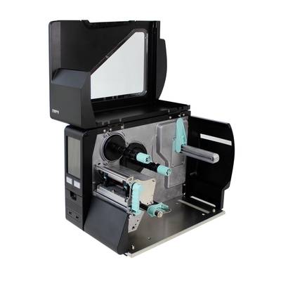 An industrial label printer with an open casing reveals the mechanism for loading label rolls and ribbon.