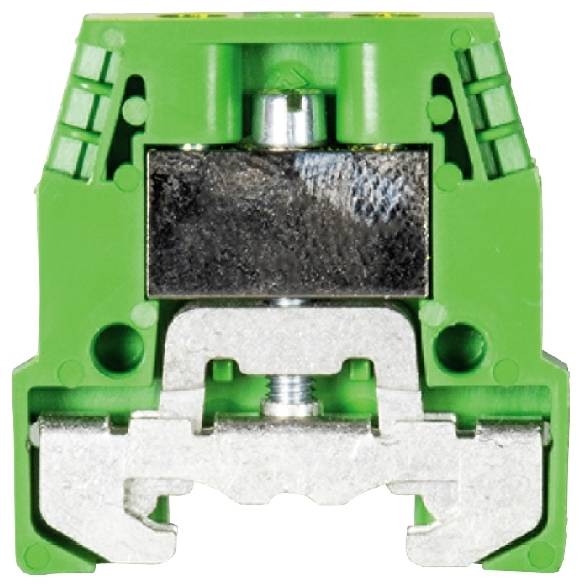 Green earth terminal with a metal screw in the centre, a typical component in electrical junction boxes for connecting cables.
