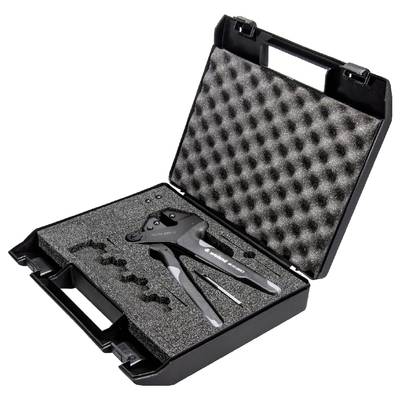 Open black tool case with foam lining, containing a crimping plier and several attachments.