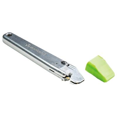 Metal cutting tool with 'wieland' logo on the left, next to a small green plastic piece on the right.
