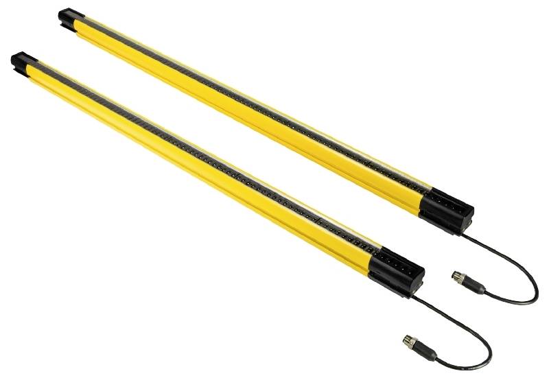 Two yellow safety light curtains with cable connection, used for safeguarding machinery in industrial environments.