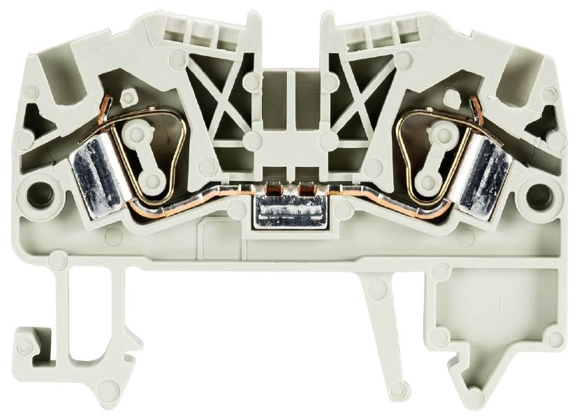 A grey electrical terminal with copper connections that enables electrical current flow; relevant for electrical wiring.