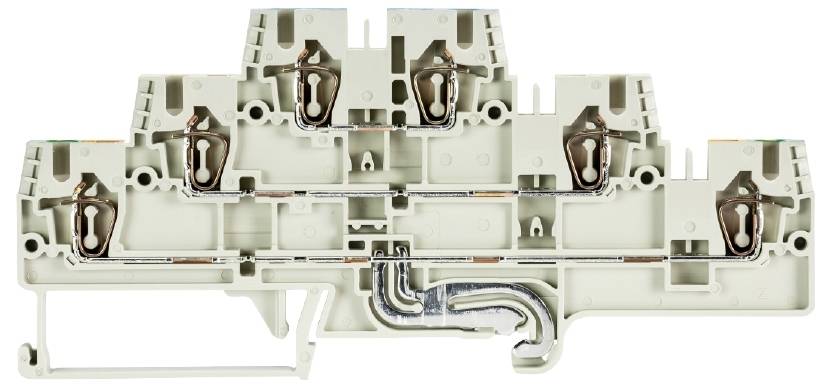 Electrical terminal block in close-up view, showing internal metal connections and plastic housing.