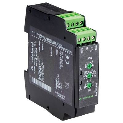 A black electric time relay with green terminals and labels, suitable for use in control systems.