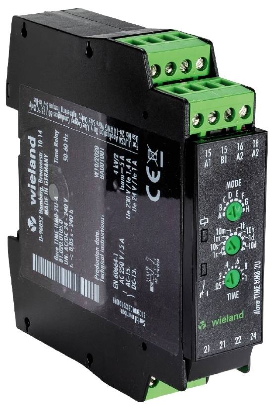 Electrical time relay with a black housing and green terminals, displaying various settings and mode options on the front panel.