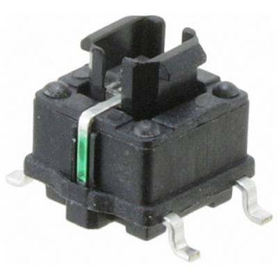 A black mechanical key switch with four metal pins and a central green stem, used in keyboards for tactile feedback on key presses.