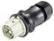 'A black and white electrical plug connector, cylindrical in shape, with multiple round terminals visible.'