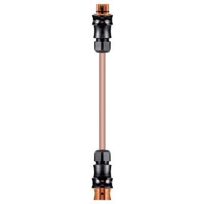 A coupling adapter with black and copper-coloured metal parts and a long, slender hose in between.