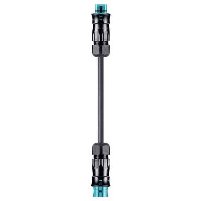 A cylindrical, black tool with two brightly blue ends, presumably an adapter or an extension.
