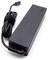 Black laptop power adapter with USB-C port and cable, coiled and secured with a hook-and-loop fastener. Device positioned at an angle in the image.