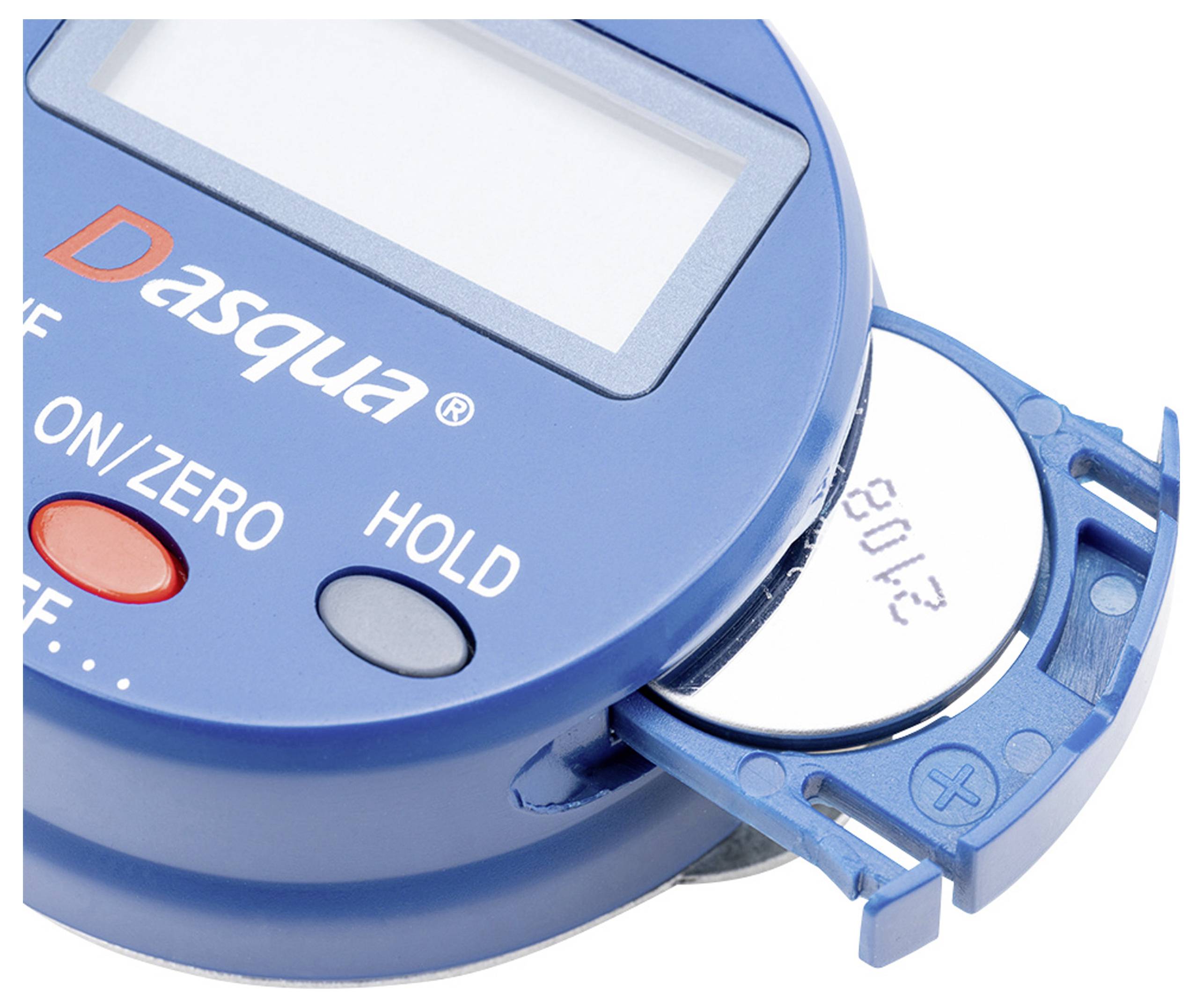 Close-up of a digital measuring device with a removable button cell on the side. Display and control buttons are visible.