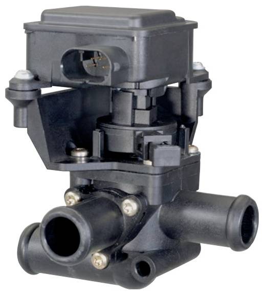 A black, complex plastic valve with multiple connections and a rectangular housing on top, likely for water pipelines.