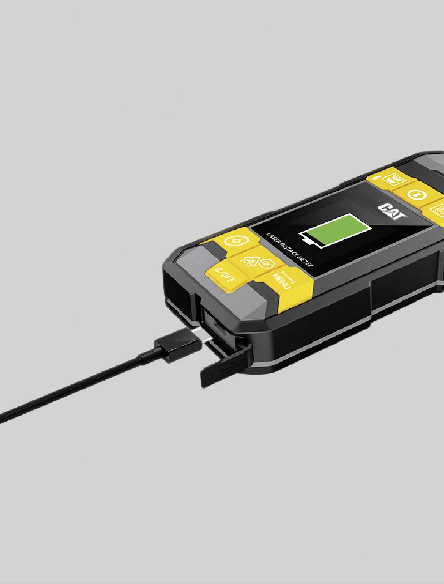 A battery charger with a digital display indicates an almost fully charged battery. It is connected to the power supply via a cable.