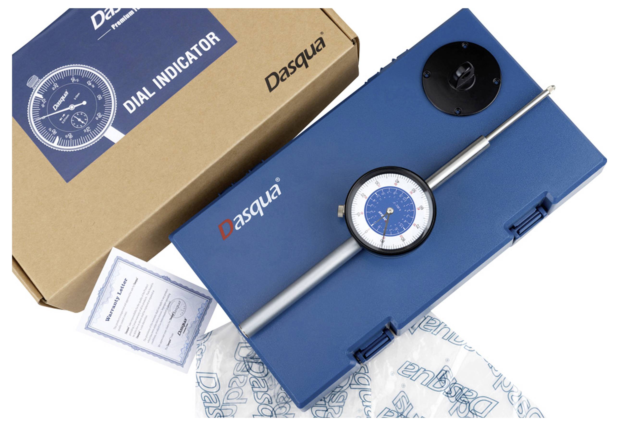 The image shows a blue storage box with a measuring instrument and a carton labelled 'Dial Indicator' by Dasqua. A certificate is lying beside it.