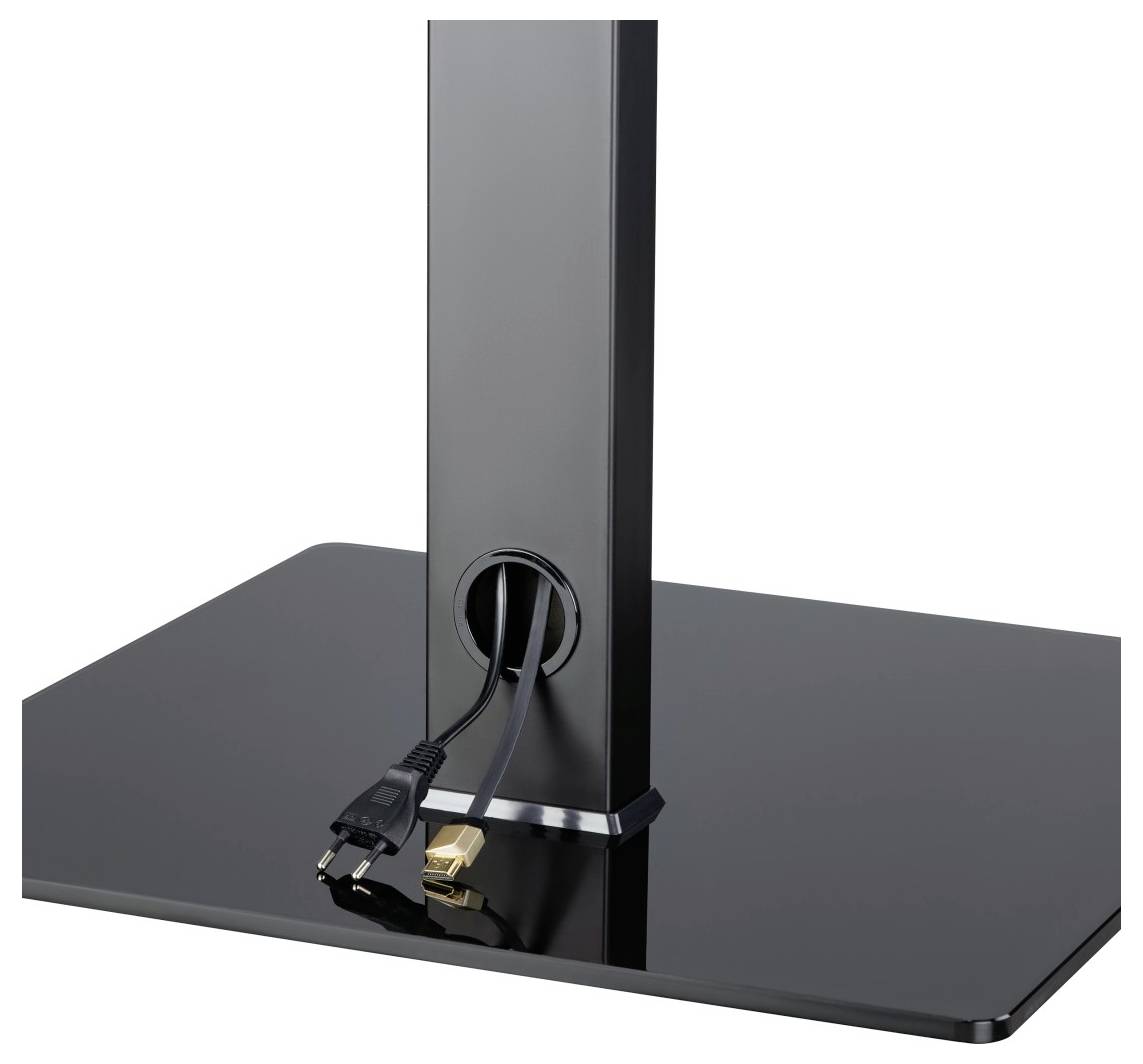 A black monitor stand with cable routing, two cables at the rear: a power cable and an HDMI cable.