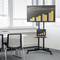 A conference room with a screen displays a bar graph on the topic of 'Development'. A laptop shows the same diagram.
