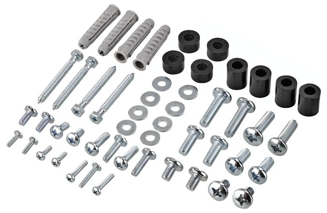 A set of screws, wall plugs, washers, and spacers, neatly arranged on a flat surface.
