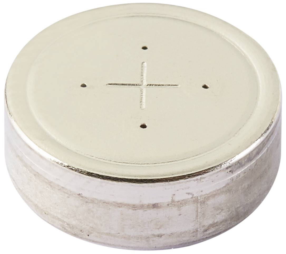 A round, flat magnet with a cross marking and four small dots on the top surface, presumably for alignment purposes.