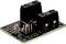 A black electronic module with multiple connection pins and two black connectors, mounted on a circuit board.