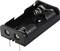 Black plastic battery holder for two AA batteries with metal springs and connection pins.