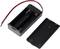 Black plastic battery holder case for two AA batteries with removable lid; shows red and black connection wires.