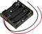 Battery holder for four AA batteries with red and black cables for powering electronic devices.