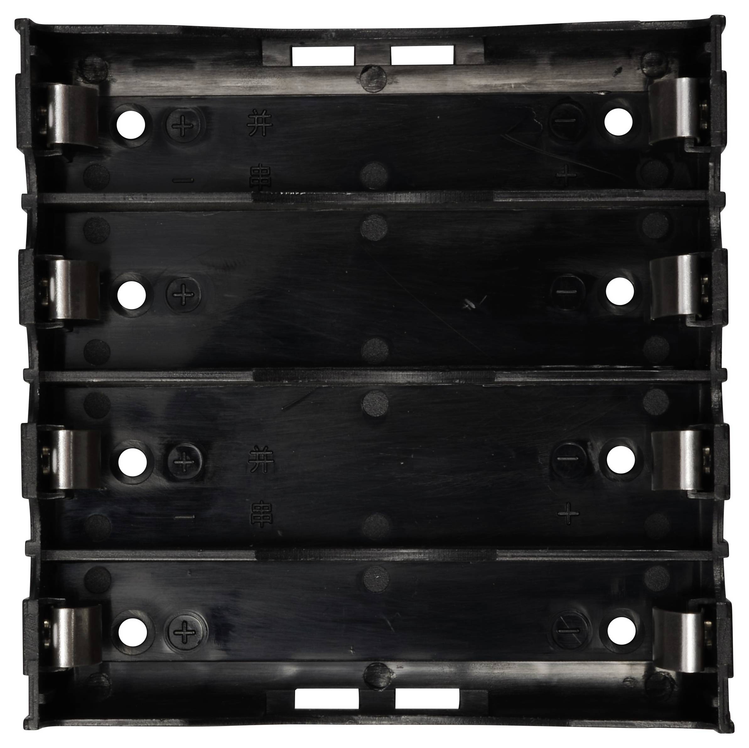A black plastic casing with multiple mounting holes and clips on the sides.
