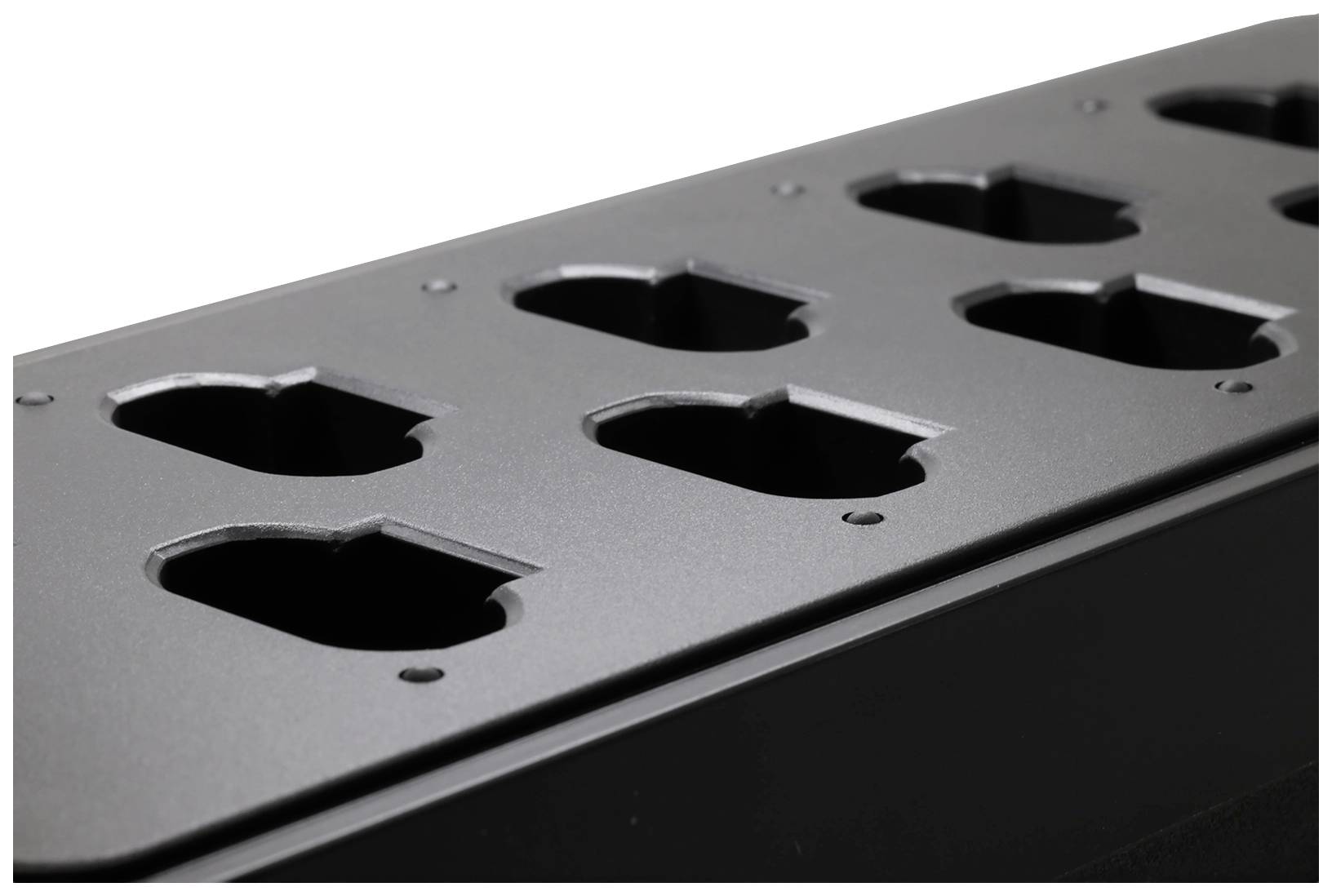 A multi-socket extension block with several sockets in a row.