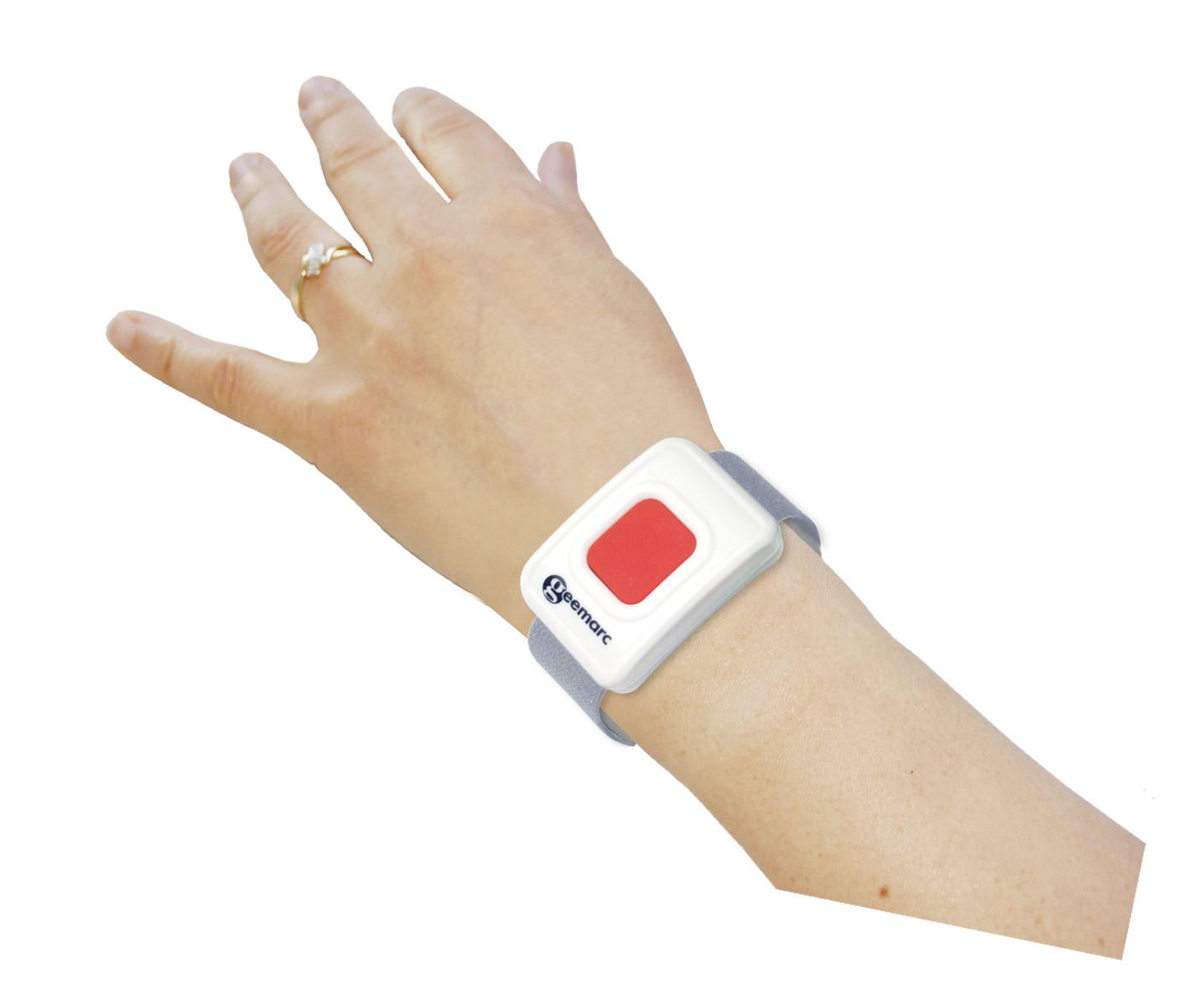 A hand is holding an emergency call bracelet with a red button, ready to be activated in emergencies.