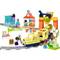 Toy train set on tracks with building blocks, figurines, and animals, including a yellow train, railway station, windmill, and colourful buildings.