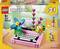 LEGO Creator 3-in-1 Set with a pink typewriter, decorated with flowers, recommended for ages 8 and up, 363 pieces.